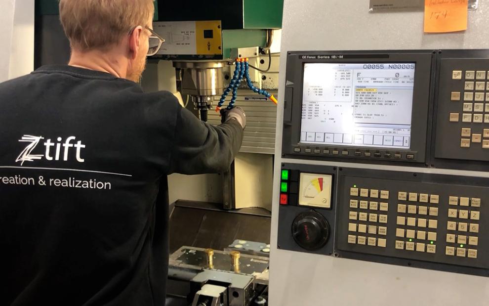 Worker using augmented reality headset to assist with lock assembly